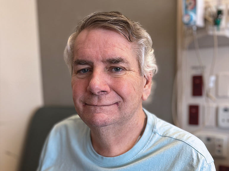 Bill Gierhart smiling after rehabilitation.