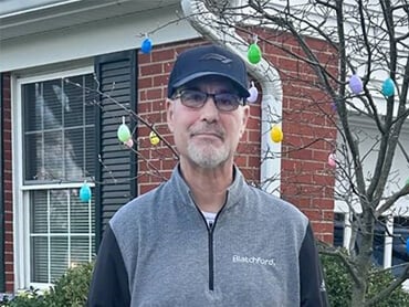 Rick Rocco smiles after returning home from rehabilitation.